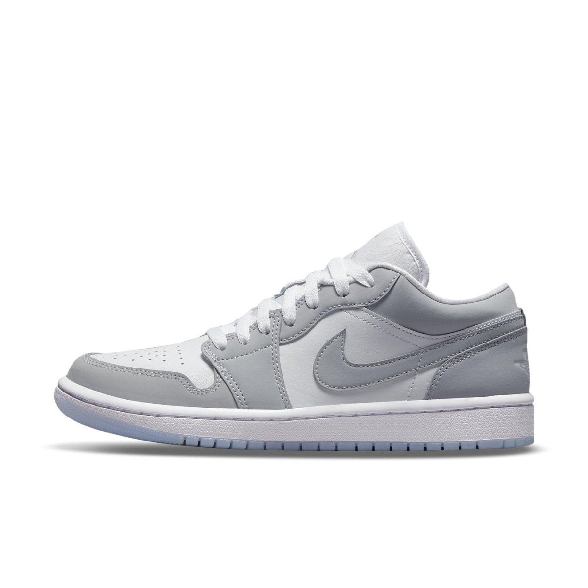 Jordan 1 Low Wolf Grey women's sneakers in premium leather with gray and white colorway and iconic Nike Swoosh.