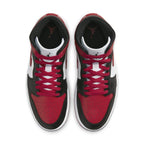 Air Jordan 1 Mid WMNS Bred Toe sneaker featuring red, black, and white colorway and classic design.