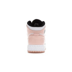 Back view of Air Jordan 1 Mid Arctic Orange Black Toe GS showcasing pastel accents and sleek design.