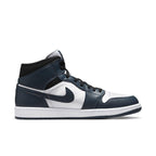 Air Jordan 1 Mid Armory Navy sneaker featuring suede and leather upper in navy and white colorway.
