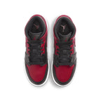 Top view of Air Jordan 1 Mid Banned 2020 GS sneakers, featuring black and red design with white sole.