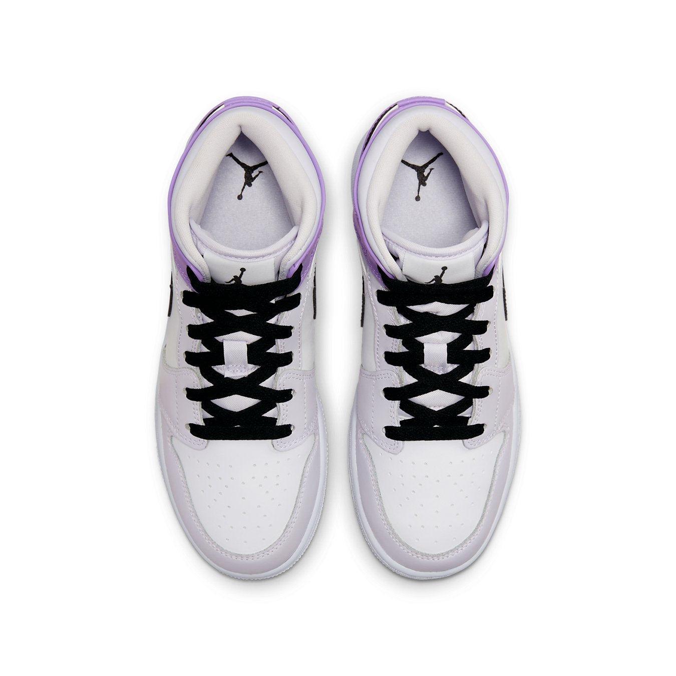 Top view of Air Jordan 1 Mid Barely Grape GS sneakers featuring white panels and purple accents.