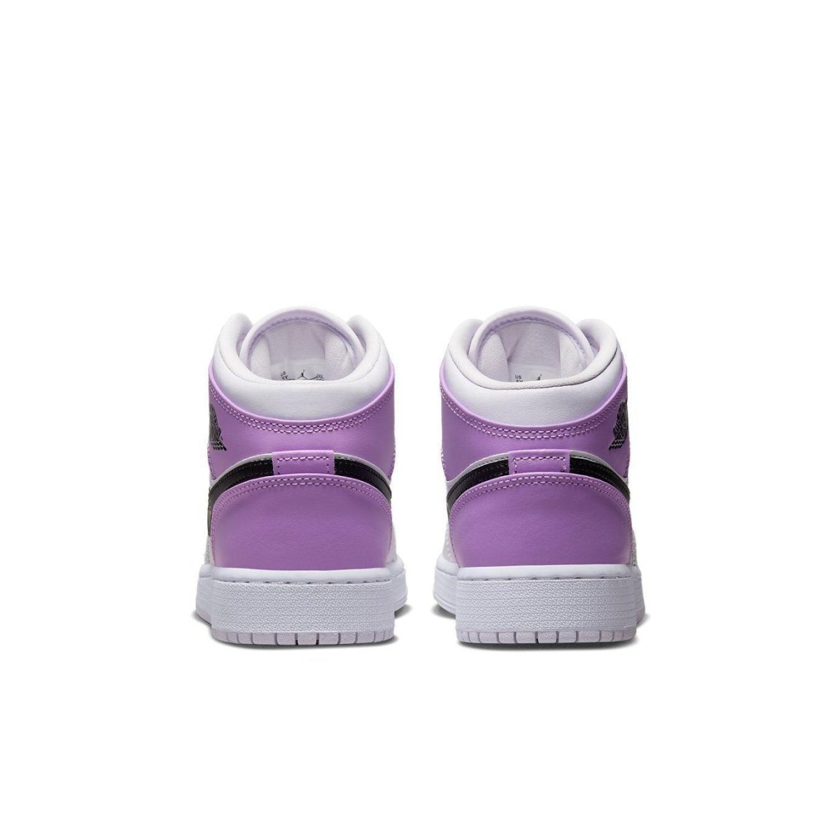 Back view of the Jordan 1 Mid Barely Grape GS sneakers in purple and black with white sole.
