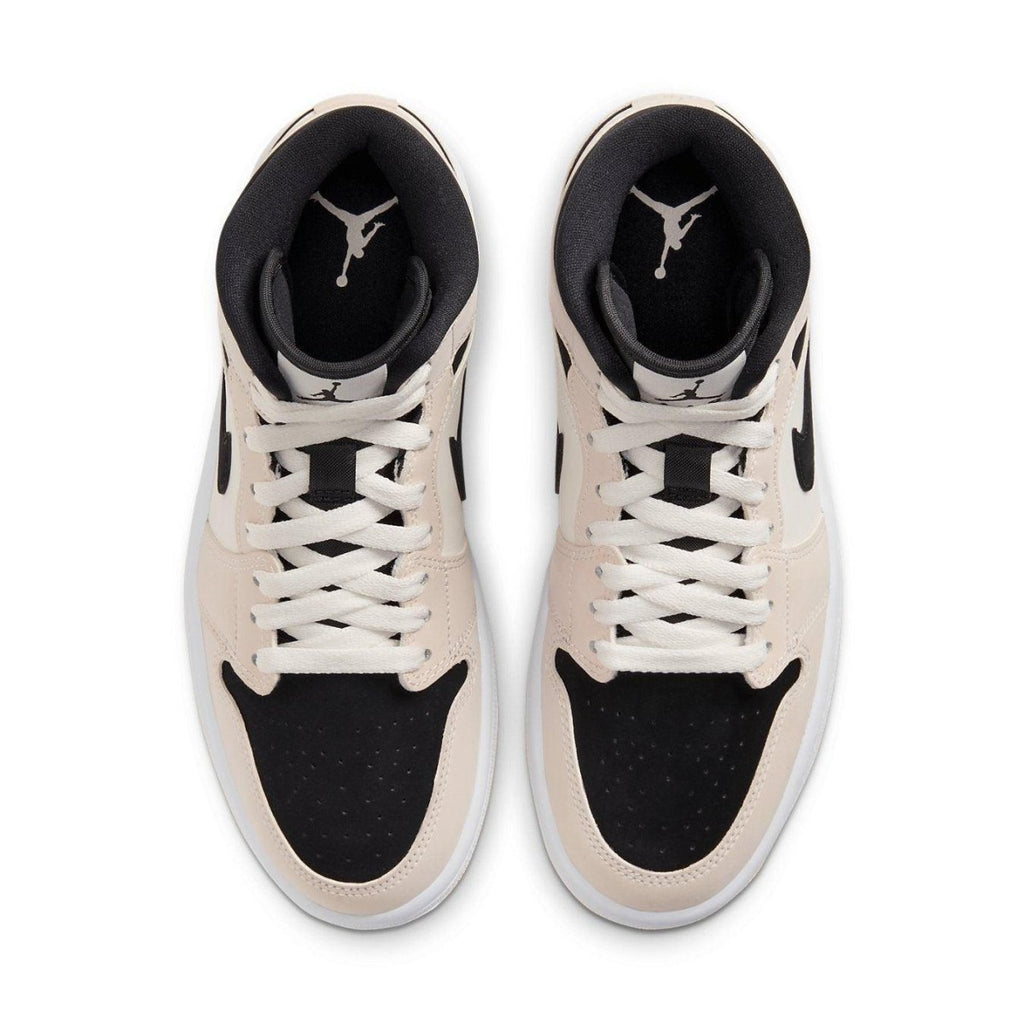 Air Jordan 1 Mid Barely Orange sneakers top view featuring beige and black design with white laces.