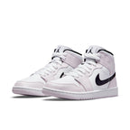 Jordan 1 Mid Barely Rose (W) featuring white leather base with Barely Rose accents and black Swoosh.