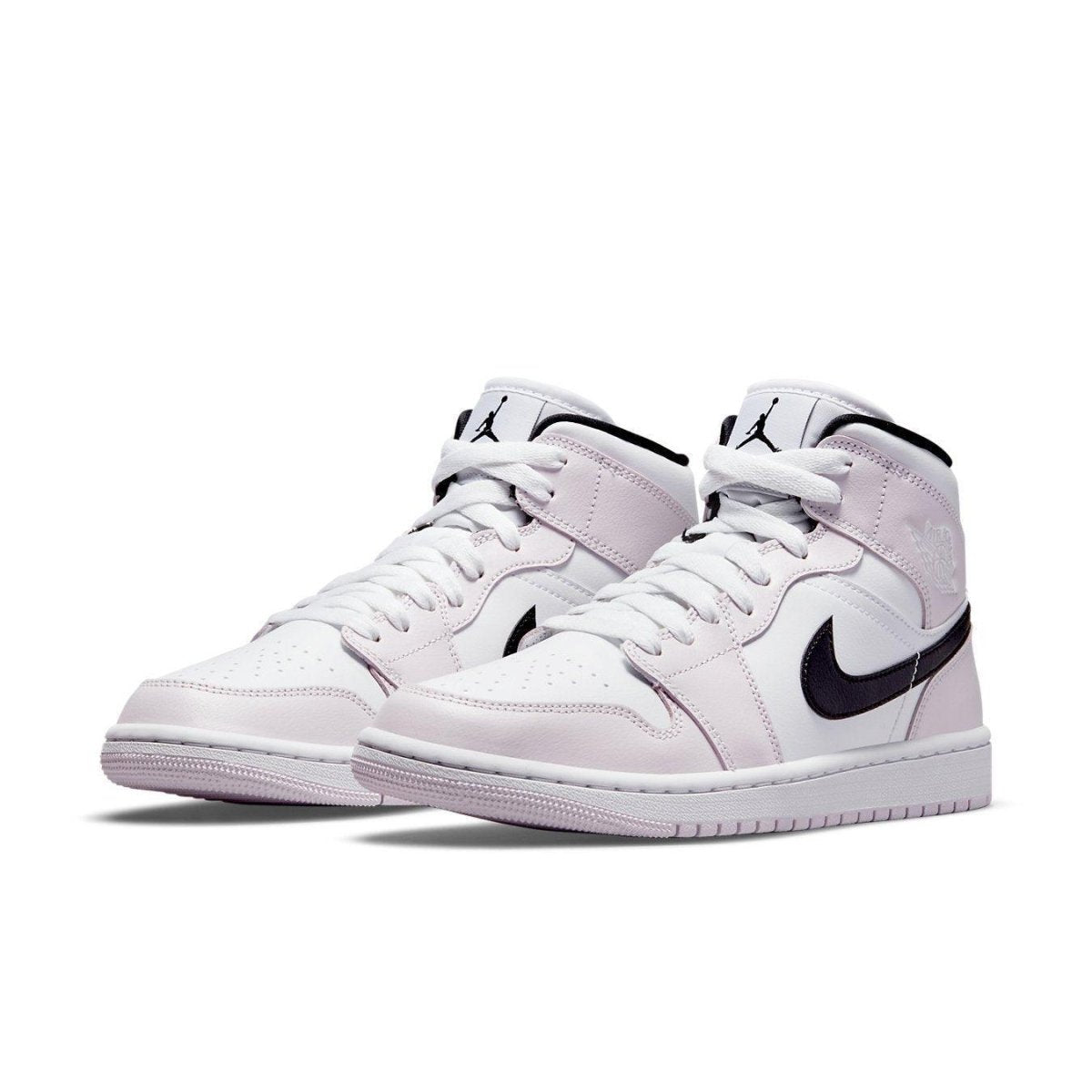 Jordan 1 Mid Barely Rose (W) featuring white leather base with Barely Rose accents and black Swoosh.