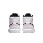 Back view of the Jordan 1 Mid Barely Rose women's sneakers featuring pink and black design elements.