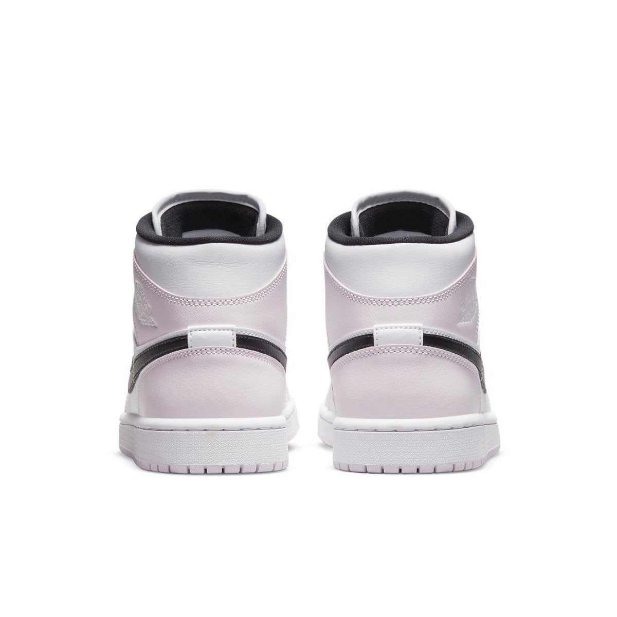 Back view of the Jordan 1 Mid Barely Rose women's sneakers featuring pink and black design elements.