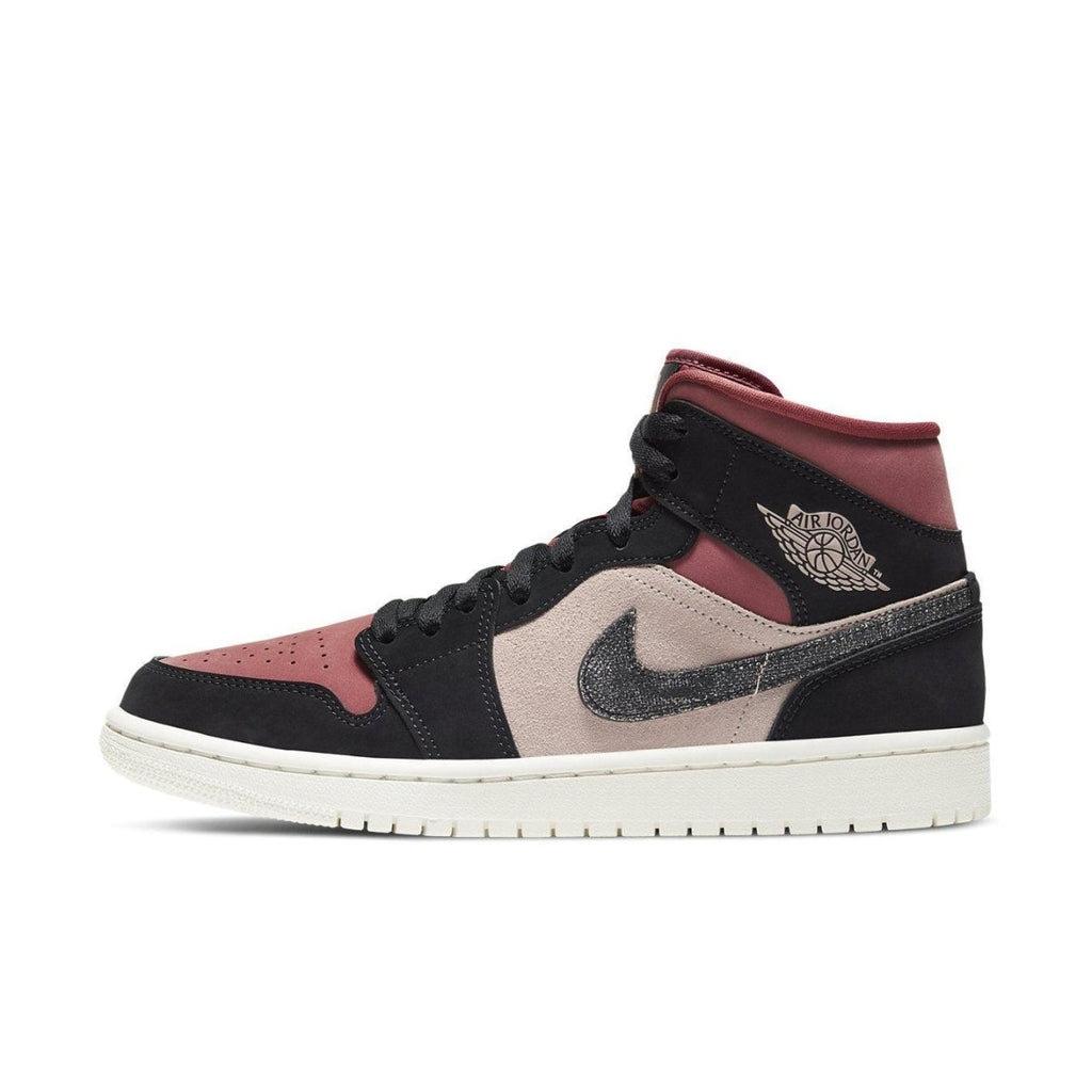 Air Jordan 1 Mid Canyon Rust women’s sneaker in pink suede and dark coral nubuck, featuring a classic Swoosh.