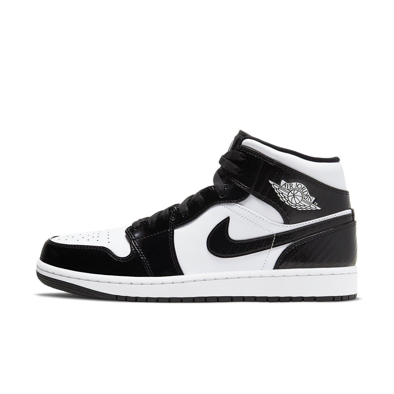 Jordan 1 Mid Carbon Fiber All-Star 2021 shoe with black and white leather design, featuring patent overlays.