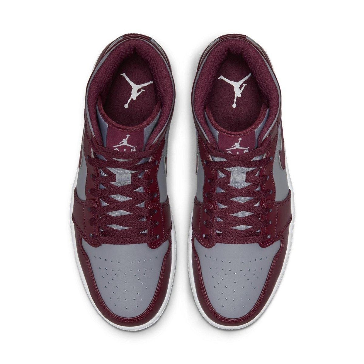 Air Jordan 1 Mid Cherrywood Red sneakers featuring a burgundy and gray upper with white logo accents.
