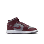 Jordan 1 Mid Cherrywood Red (GS) sneakers showcasing a stylish maroon and grey color scheme.
