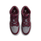 Top view of Air Jordan 1 Mid Cherrywood Red (GS) sneakers featuring multicolored design and classic silhouette.