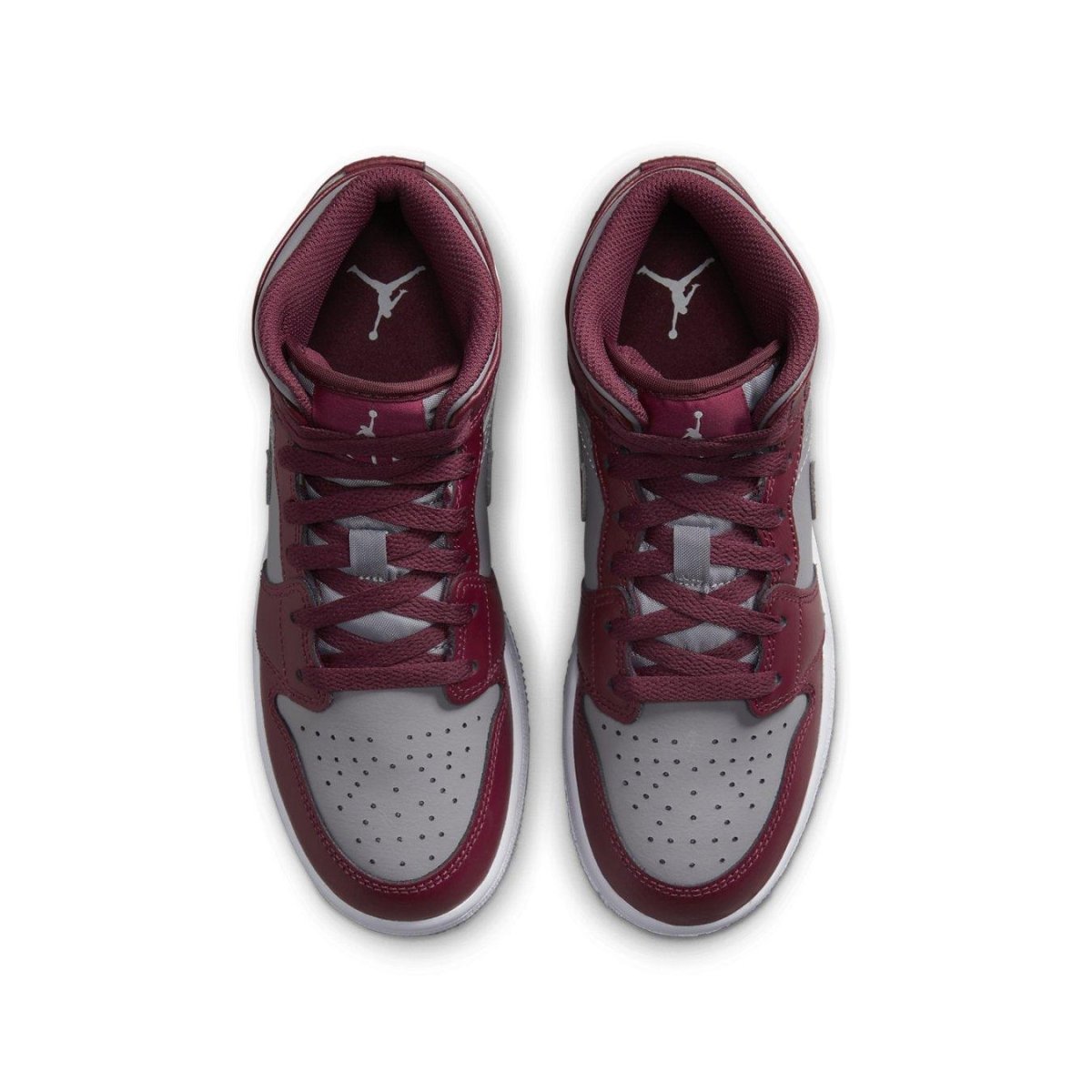 Top view of Air Jordan 1 Mid Cherrywood Red (GS) sneakers featuring multicolored design and classic silhouette.