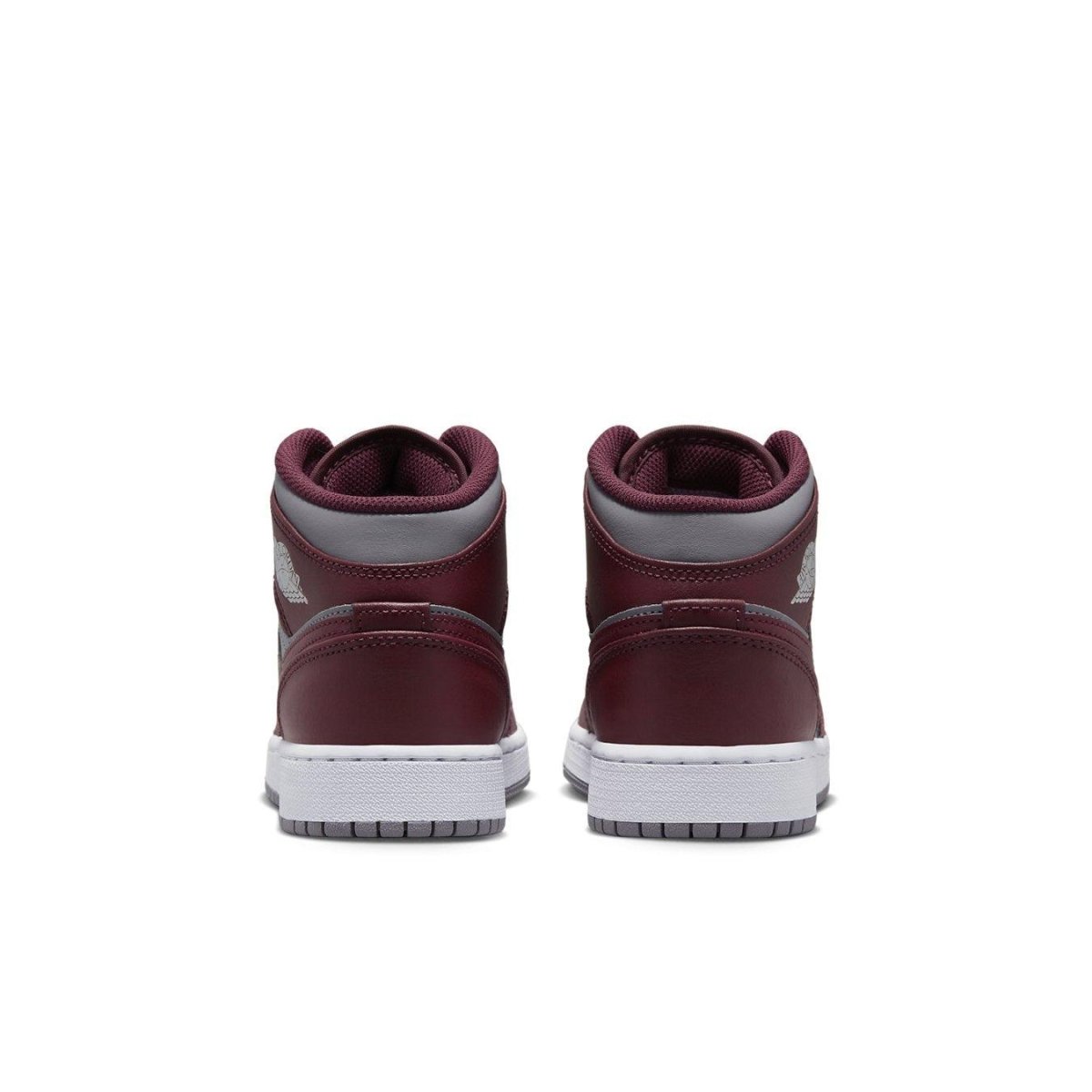 Back view of Jordan 1 Mid Cherrywood Red sneakers showcasing burgundy and grey design.