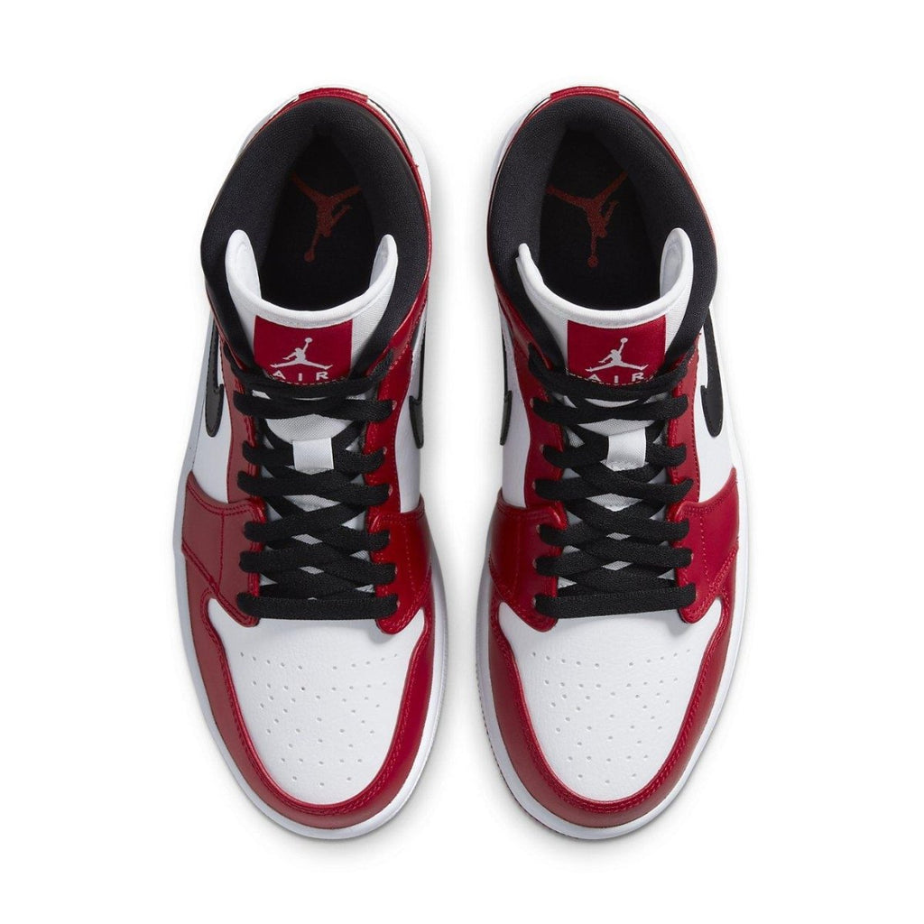Top view of Jordan 1 Mid Chicago sneakers featuring red, black, and white smooth leather design.