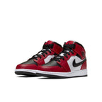 Jordan 1 Mid Chicago Black Toe (GS) sneakers in black, red, and white colorway.