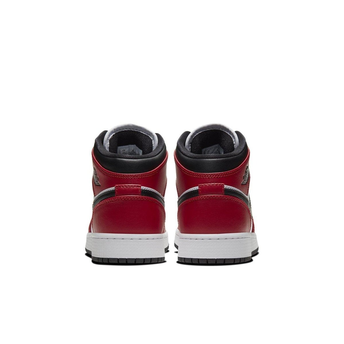 Rear view of the Jordan 1 Mid Chicago Black Toe GS sneakers showcasing the classic red and black colorway.