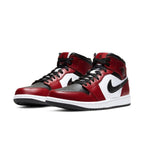 Air Jordan 1 Mid Chicago Toe sneakers in black, red, and white with iconic design and Jumpman logo.