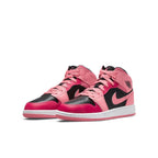 Air Jordan 1 Mid Coral Chalk in black, rush pink, and coral pink colorway, featuring white midsole.