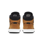 Jordan 1 Mid Desert Ochre (W) rear view showcasing suede and nylon details with signature logo.
