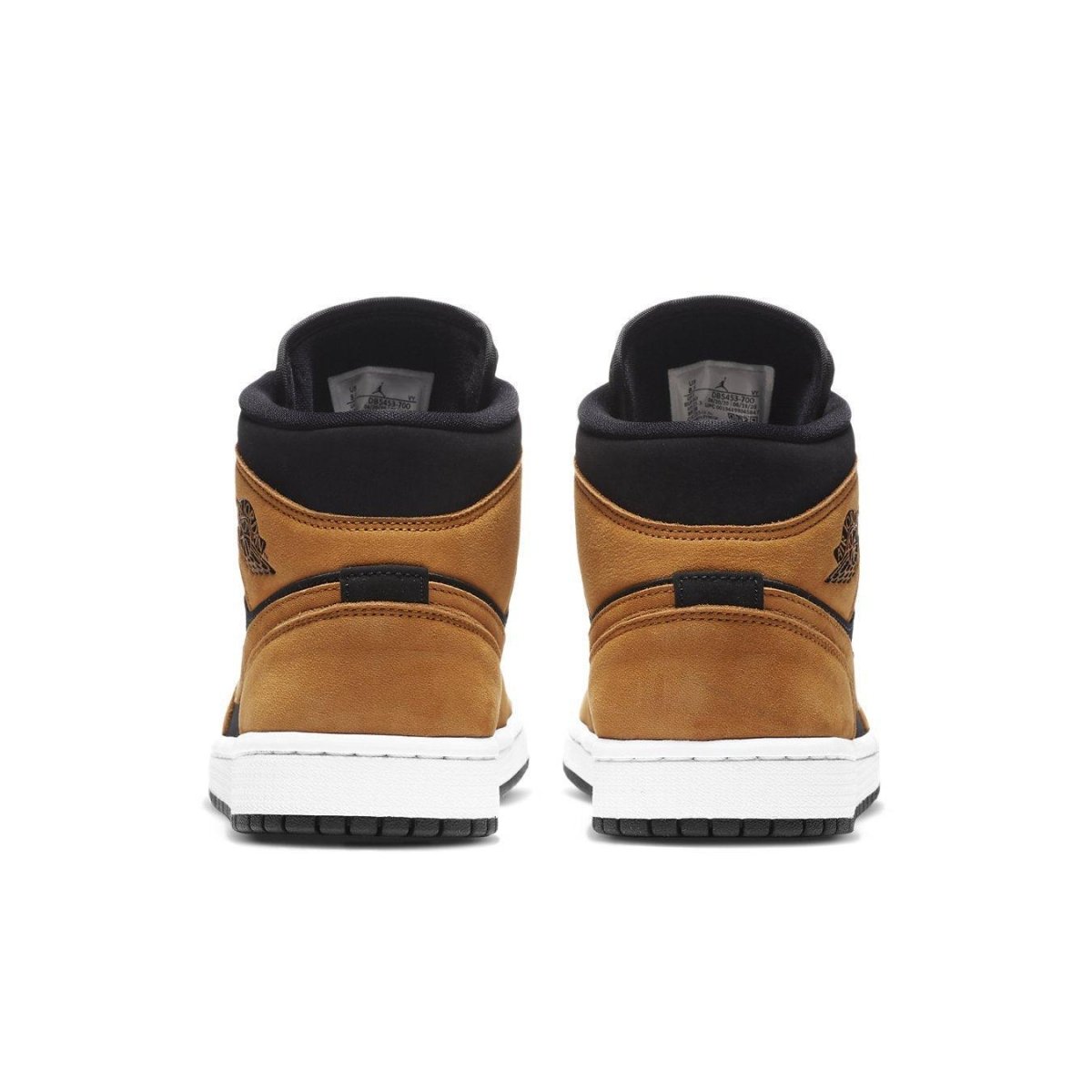 Jordan 1 Mid Desert Ochre (W) rear view showcasing suede and nylon details with signature logo.
