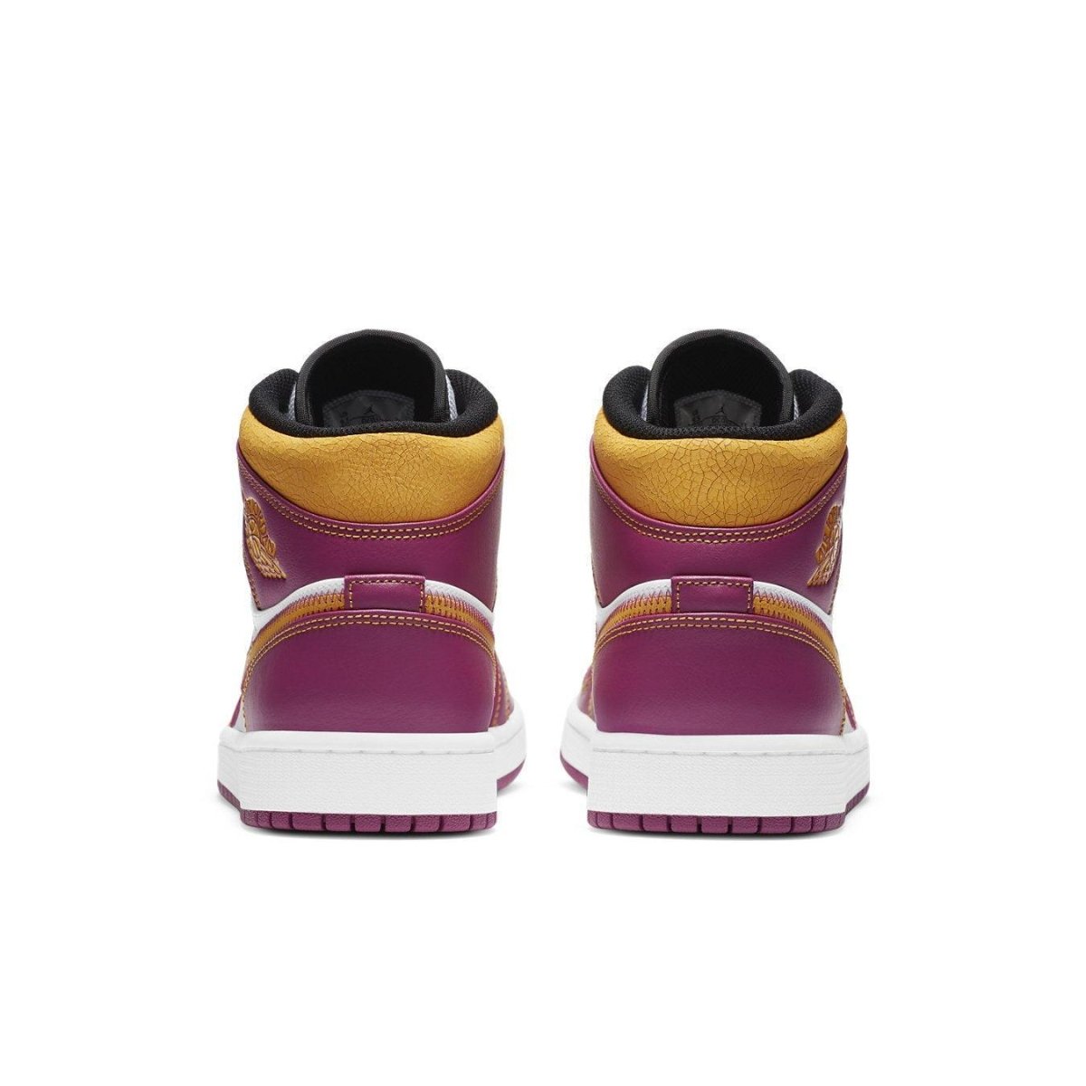 Back view of Air Jordan 1 Mid Dia de los Muertos with vibrant fuchsia and gold accents.