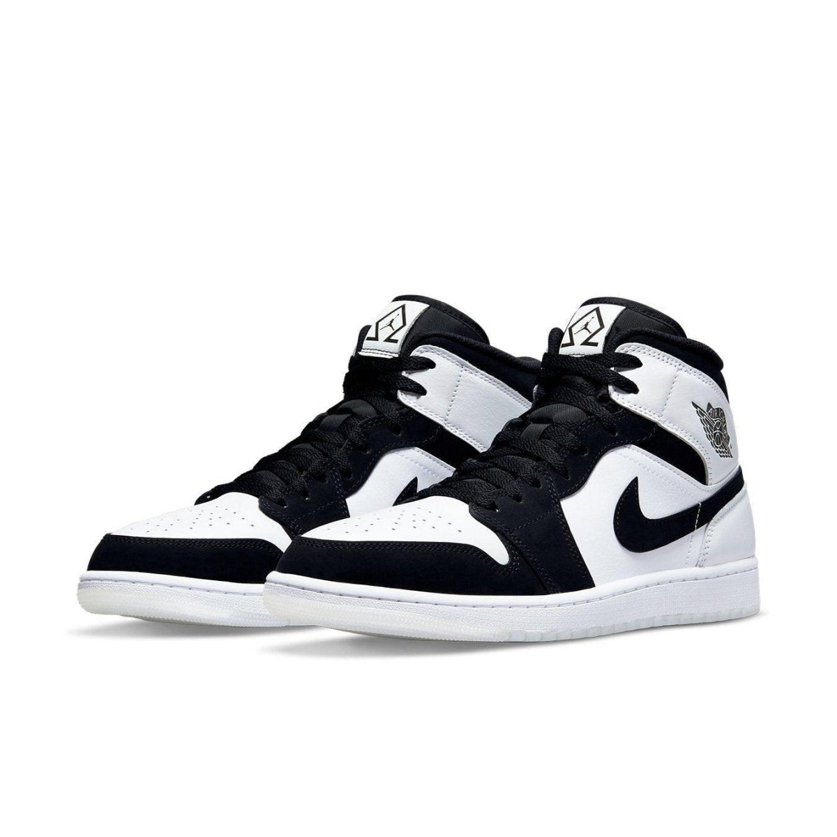 Air Jordan 1 Mid Diamond Shorts in black and white leather, showcasing the classic basketball shoe design.