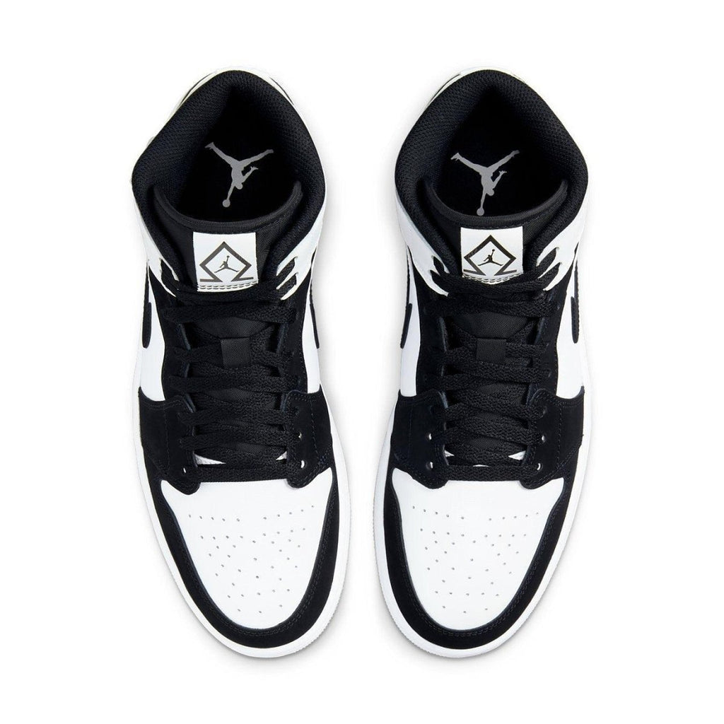 Top view of Jordan 1 Mid Diamond Shorts sneakers in black and white leather with iconic logo.