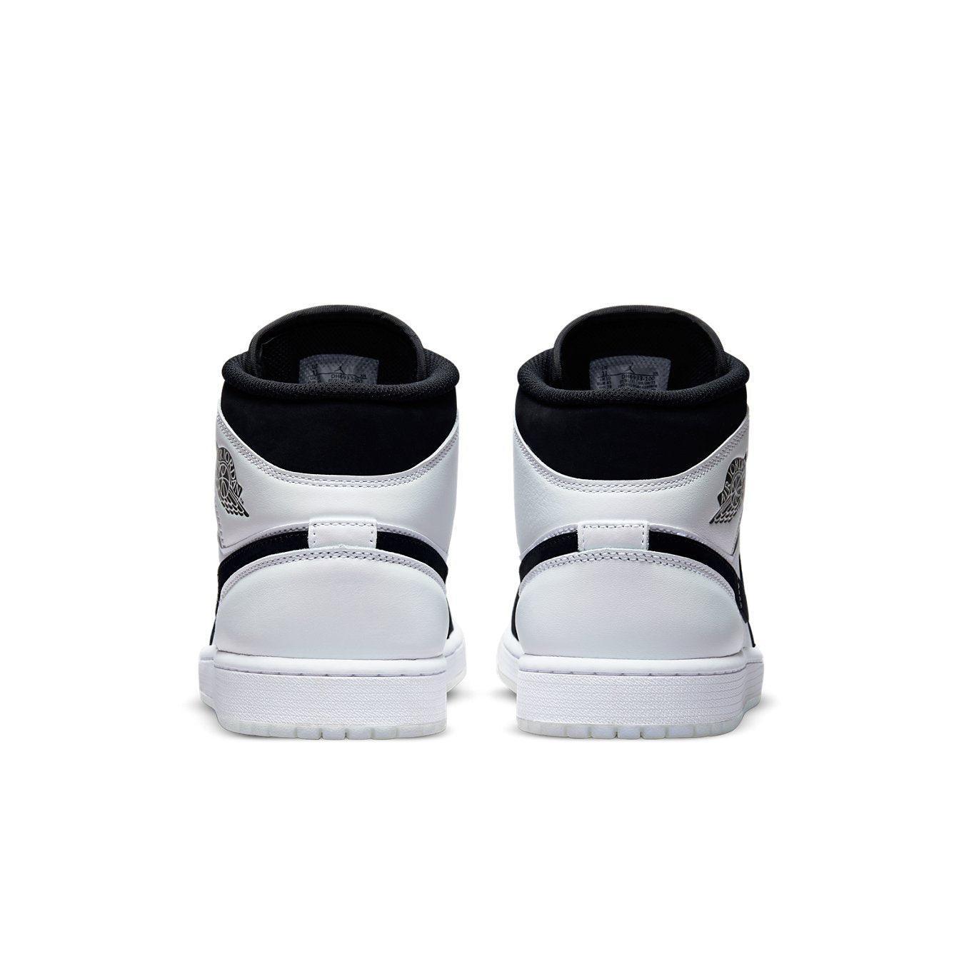 Rear view of Jordan 1 Mid Diamond Shorts, featuring white and black leather design with iconic Air Jordan branding.