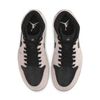 Jordan 1 Mid Dirty Powder Iridescent women's sneakers featuring pink and beige suede upper with black accents.