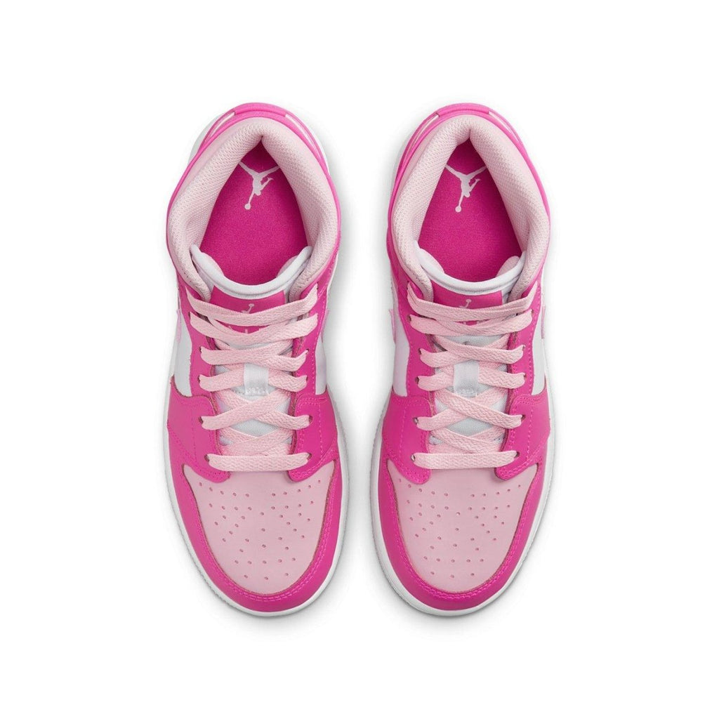 Top view of Jordan 1 Mid Fierce Pink (GS) showcasing vibrant pink and white details on the shoe.