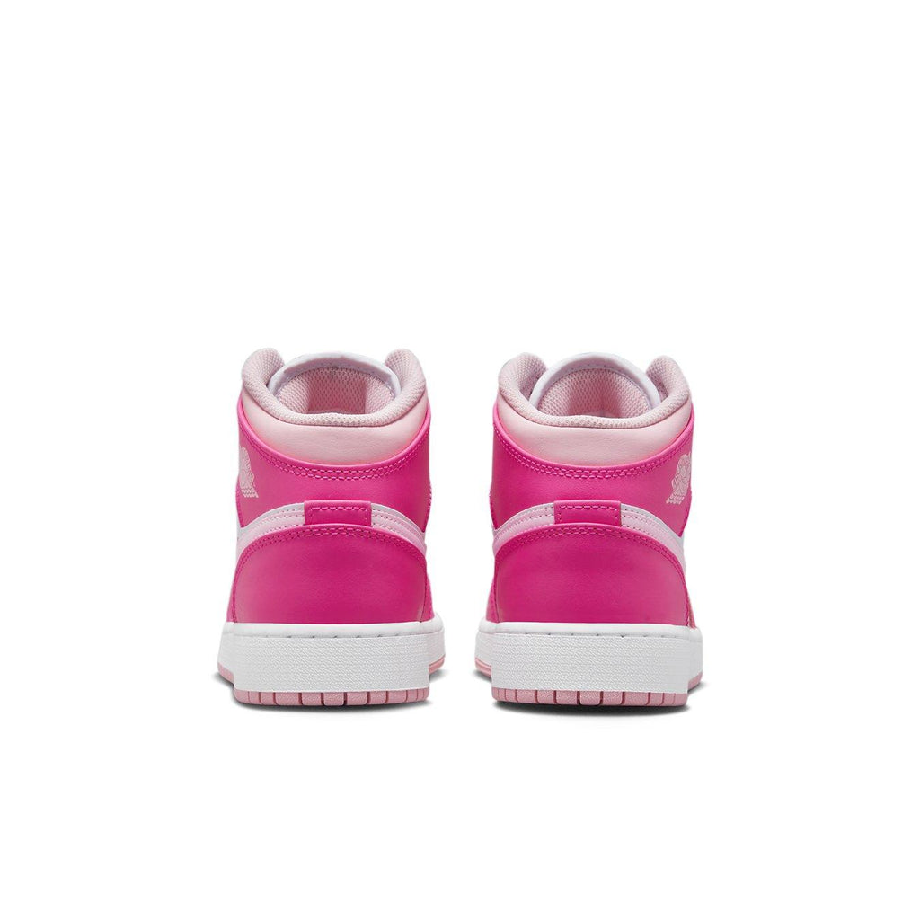 Jordan 1 Mid Fierce Pink (GS) back view showcasing vibrant pink leather design and white sole.