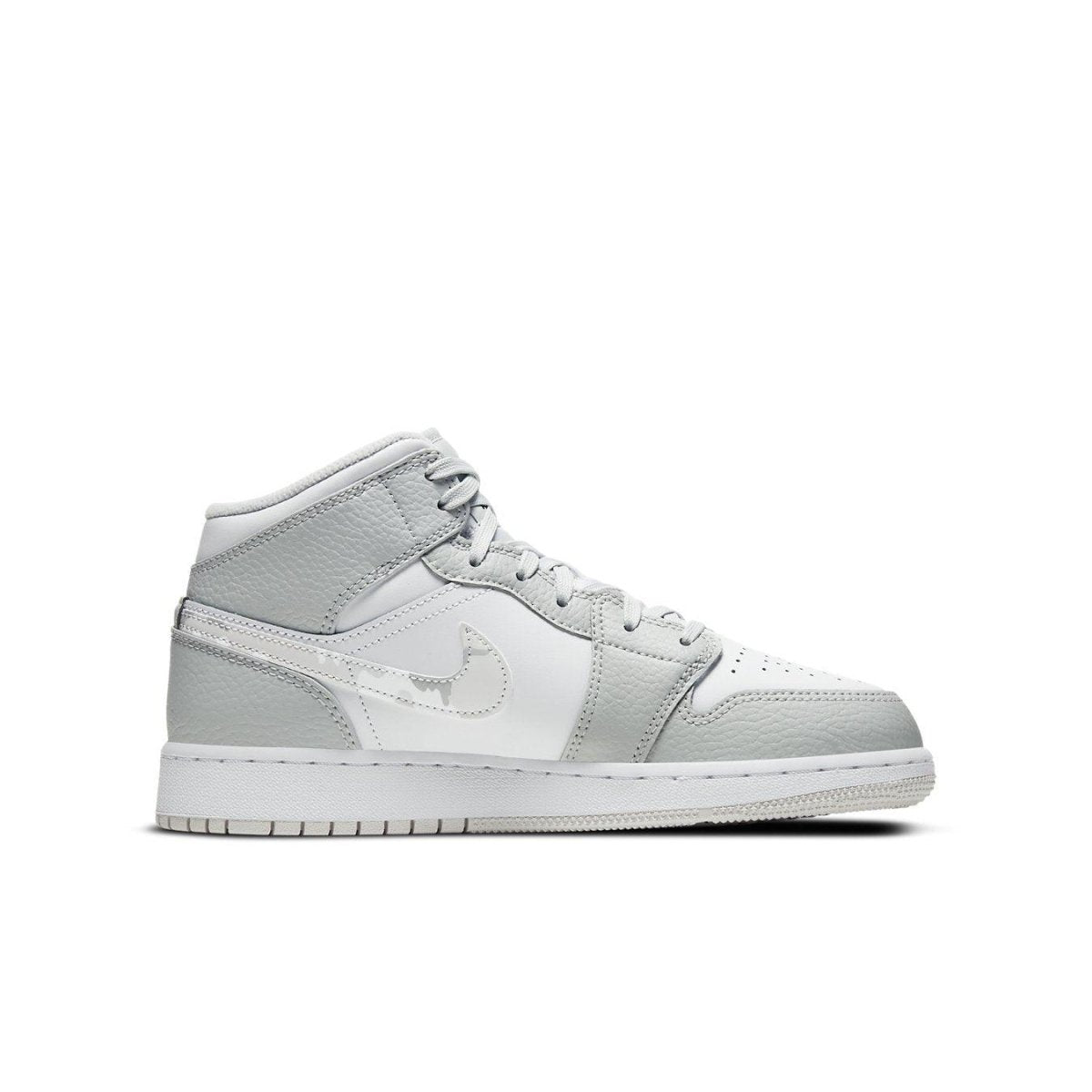 Air Jordan 1 Mid Grey Camo GS shoes featuring a grey and white camo design for kids.