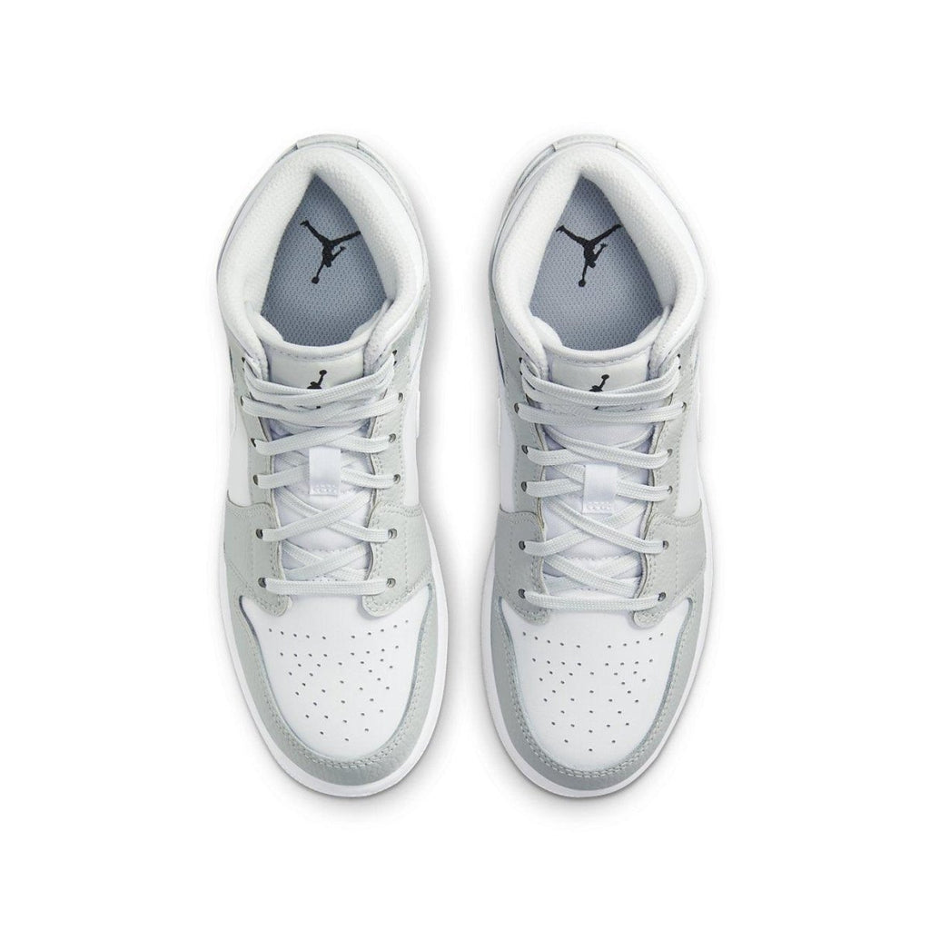 Top view of Jordan 1 Mid Grey Camo GS showcasing grey and white design, perfect for kids' sporty footwear.