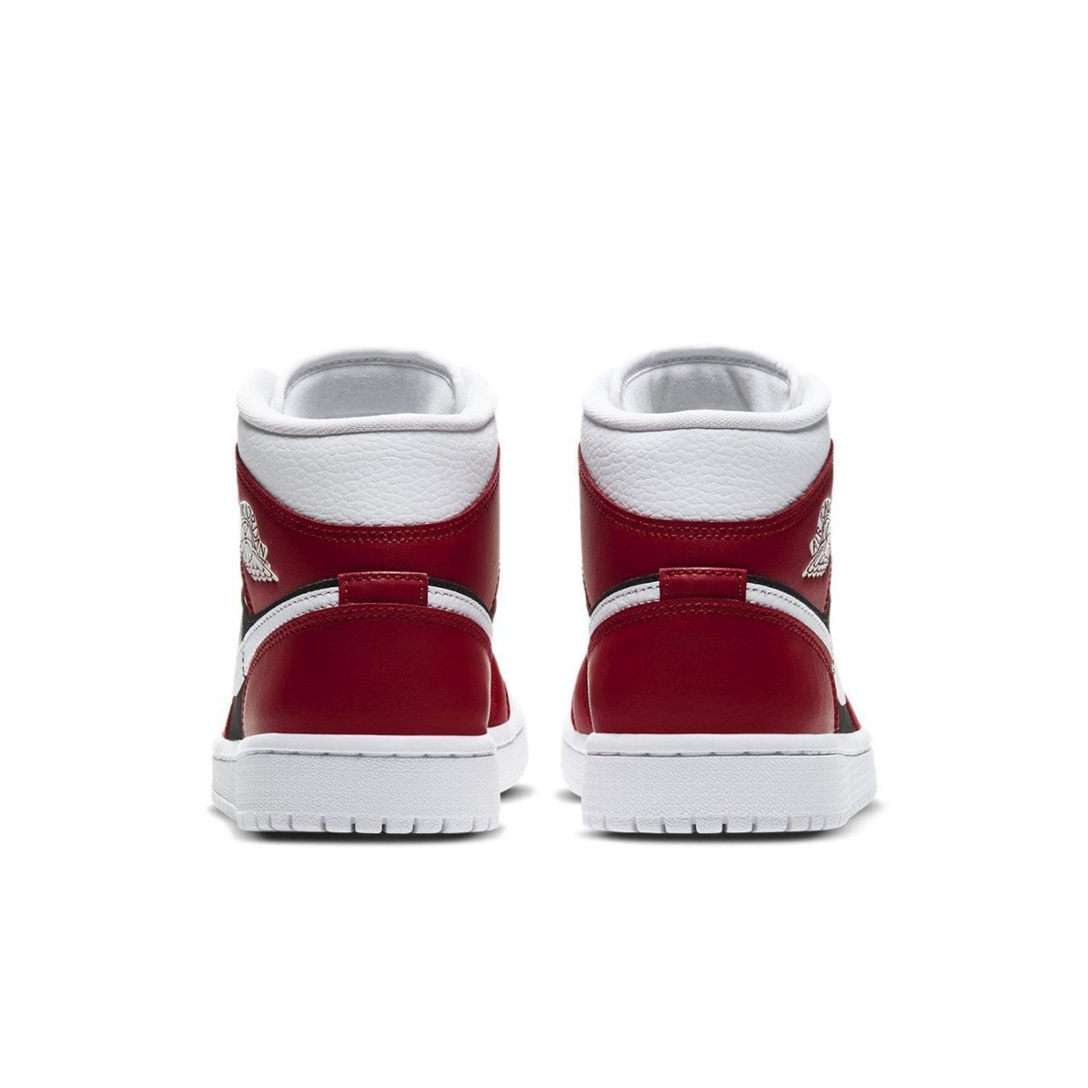 Rear view of Jordan 1 Mid Gym Red Black (W) showcasing leather design and padded collar.
