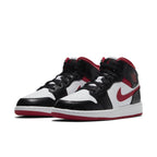 Jordan 1 Mid Gym Red Black White sneakers featuring sleek black, white leather, and vibrant red details.