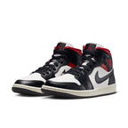 Jordan 1 Mid Gym Red Panda (W) sneaker in black, red, and white with mid-top design and rubber sole.