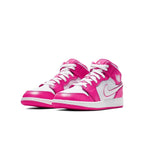Air Jordan 1 Mid Hyper Pink White GS sneakers with vibrant pink and white leather uppers and iconic Swoosh design.