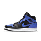 Nike Air Jordan 1 Mid Hyper Royal Tumbled Leather in black and blue colorway, stylish high-top design for basketball.