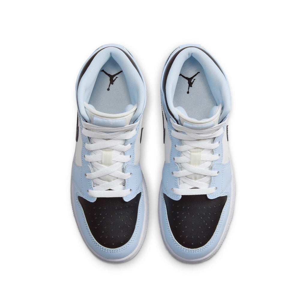 Air Jordan 1 Mid Ice Blue GS featuring icy blue overlays and black toe, sleek basketball sneaker design.