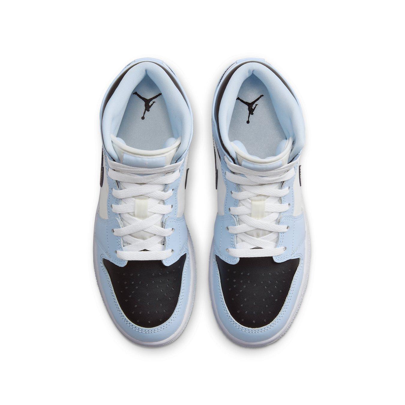 Air Jordan 1 Mid Ice Blue GS featuring icy blue overlays and black toe, sleek basketball sneaker design.