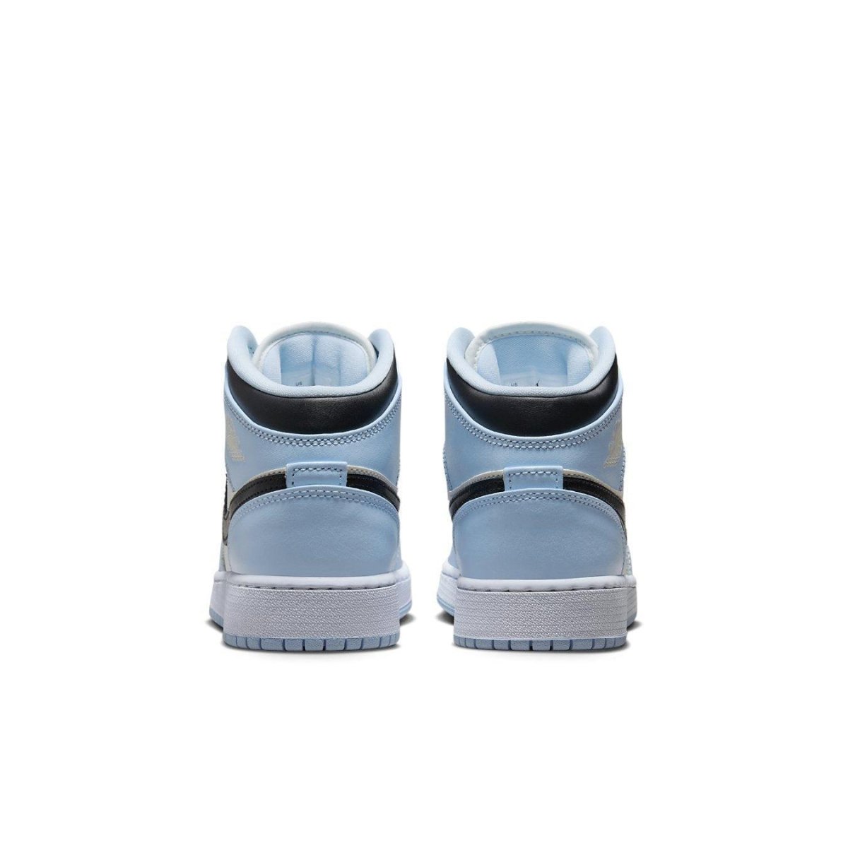 Rear view of Air Jordan 1 Mid Ice Blue GS showcasing icy blue leather and classic Nike branding.