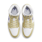 Jordan 1 Mid Lemon Wash Lapis (W) sneakers in gold and white with purple details, top view.