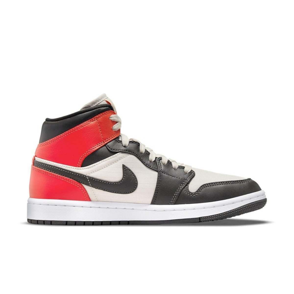 Nike Air Jordan 1 Mid SE Newsprint women's sneakers featuring black leather and vibrant red accents.