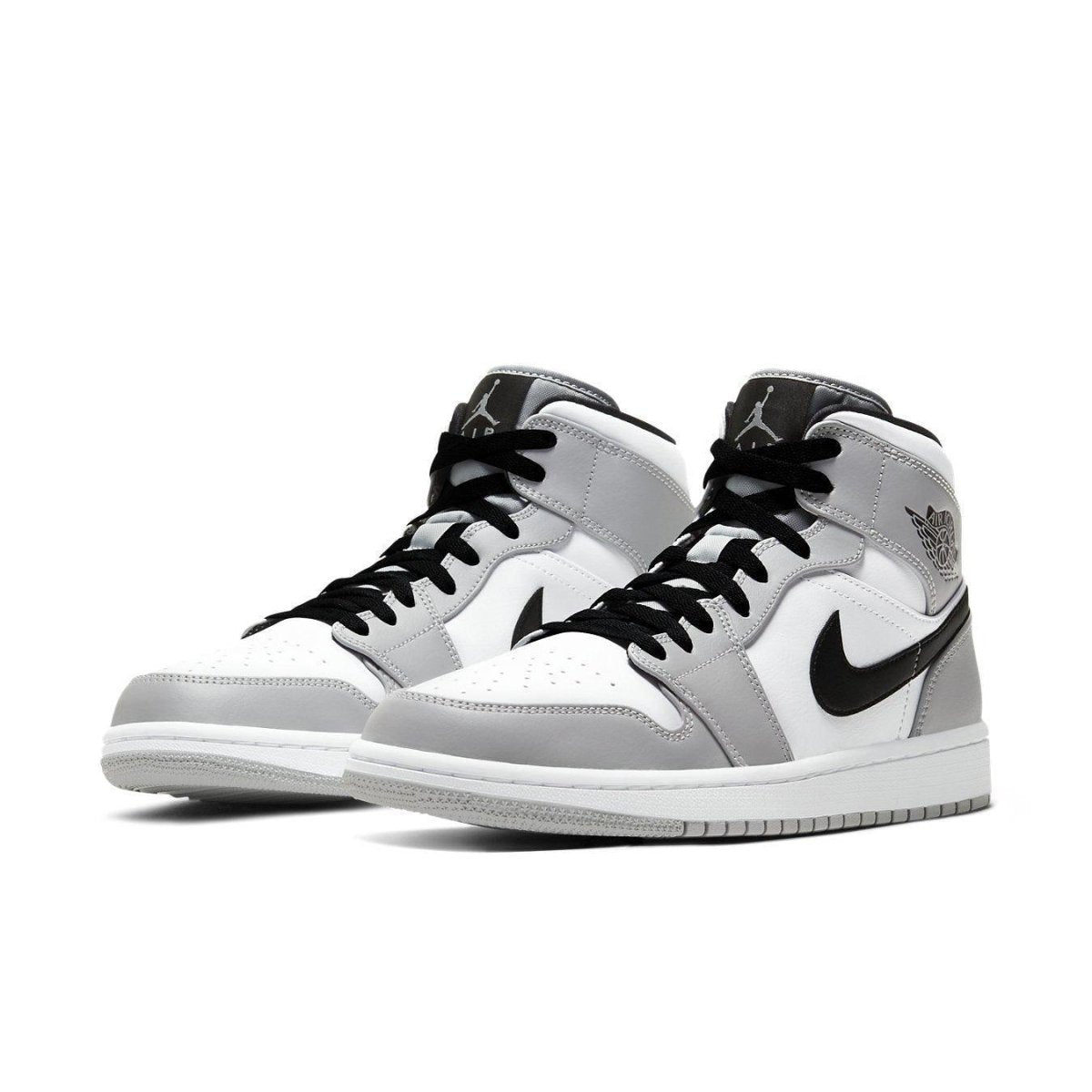 Air Jordan 1 Mid Light Smoke Grey sneakers, featuring a stylish grey and white design with black accents.