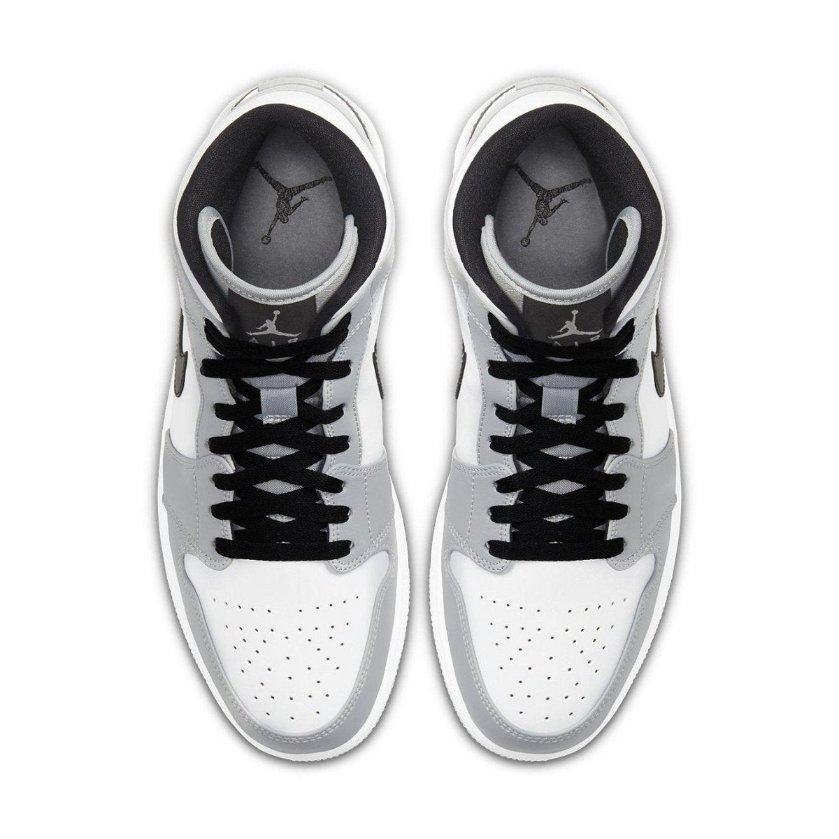 Air Jordan 1 Mid 'Light Smoke Grey' sneakers, featuring a sleek design with black laces and grey accents.
