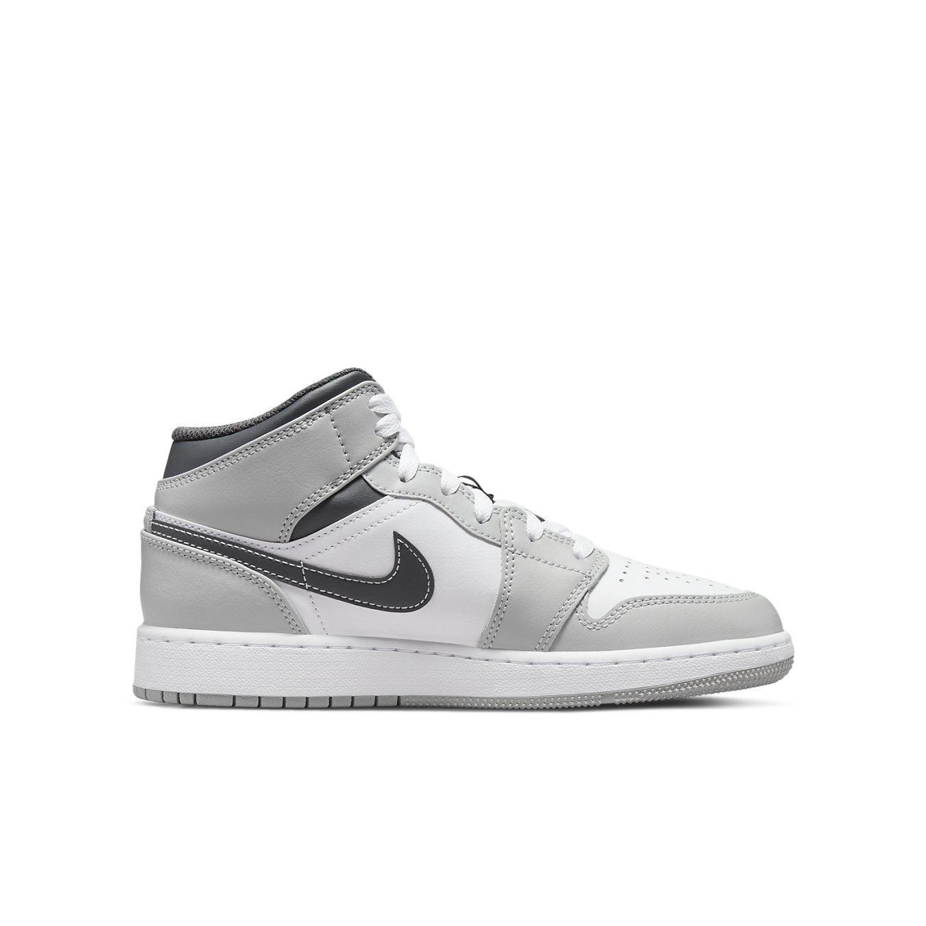 Air Jordan 1 Mid Light Smoke Grey GS sneaker in grey and white with black Swoosh and winter color scheme.