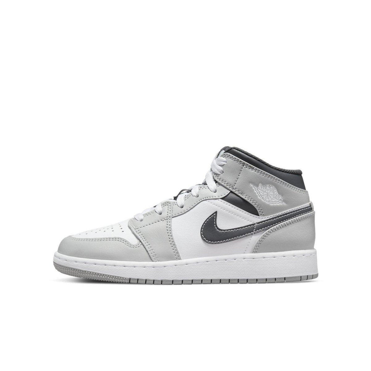 Air Jordan 1 Mid Light Smoke Grey shoes showcasing a sleek design with grey and white leather accents.