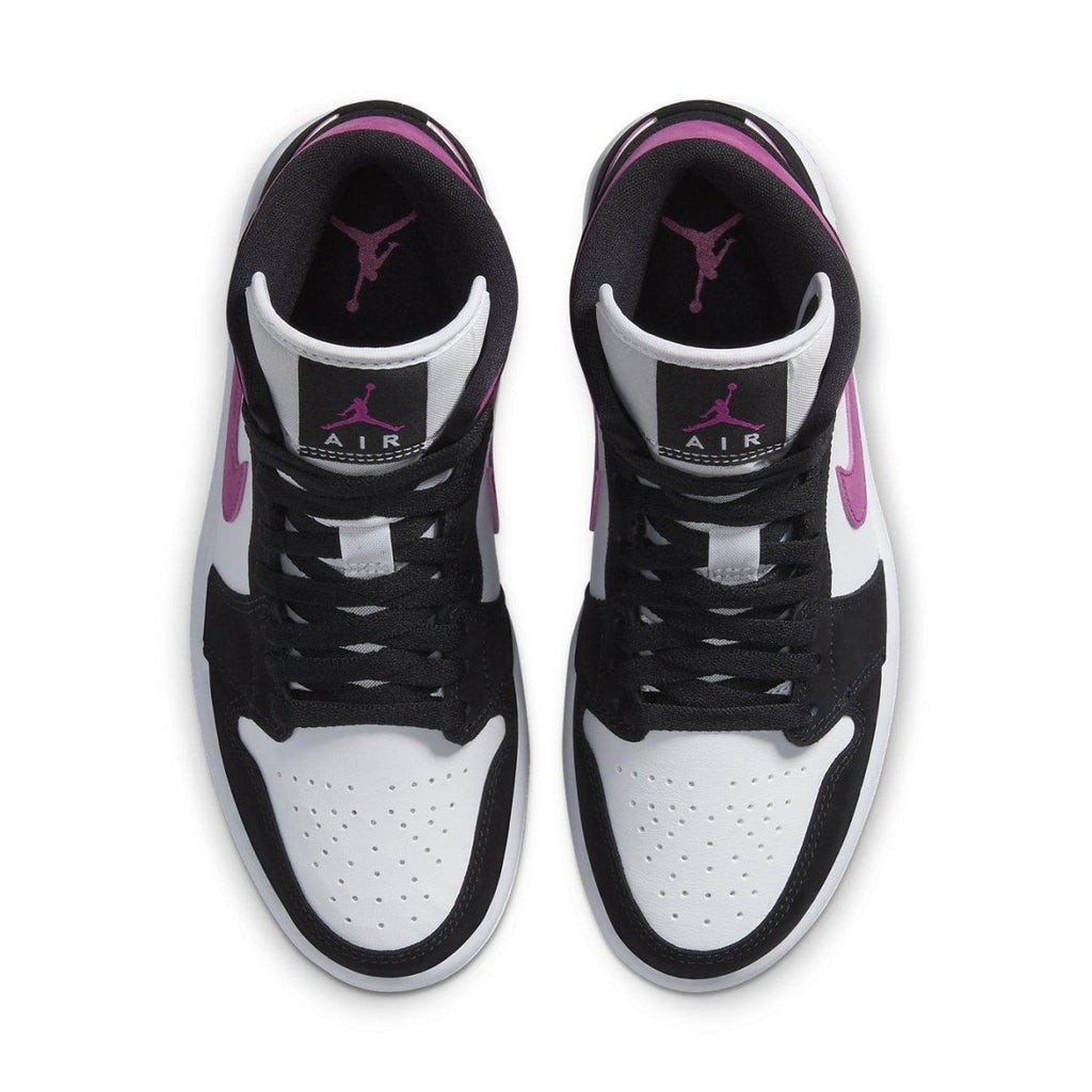 Air Jordan 1 Mid Magenta women's sneaker featuring black suede and white leather design.